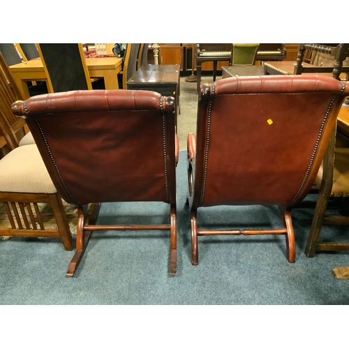 784 - Two oxblood armchairs (one - rocking chair)