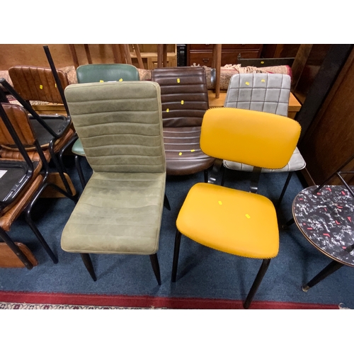 787 - Five assorted modern leather harlequin dining chairs