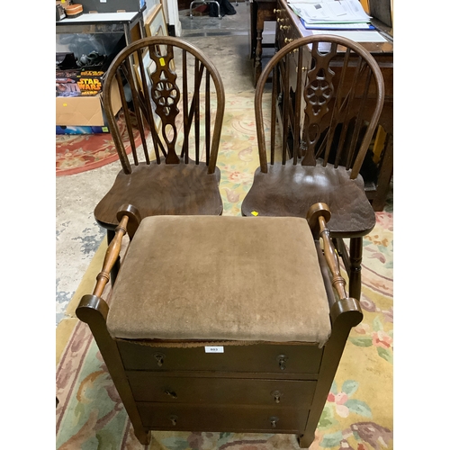 803 - An Edwardian mahogany piano stool together with two wheel back chairs. (3)