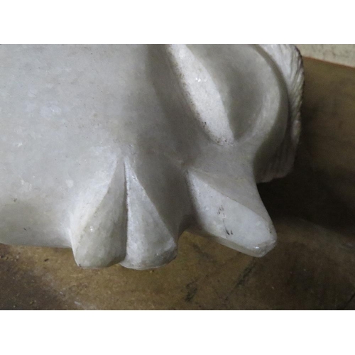 675 - A white marble quartz type statue of a tribal woman's head - H 50 cm, W 40 cm