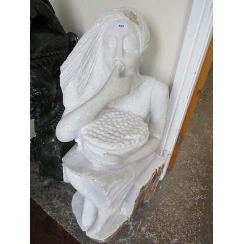 683 - A white quartz type statue of a lady eating fruit, H 96 cm, W 40 cm