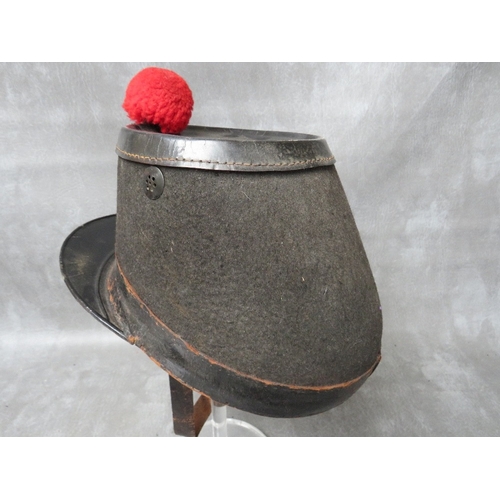 140 - AN EARLY 20TH CENTURY BELGIAN SHAKO, badged 10