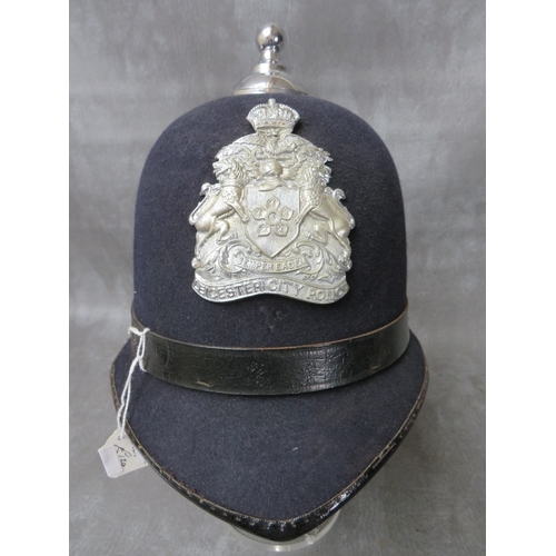 141 - A WW2 ERA LEICESTER CITY POLICE HELMET, with chrome helmet plate, along with a pair of collar badges