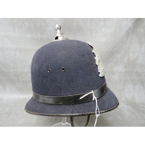 141 - A WW2 ERA LEICESTER CITY POLICE HELMET, with chrome helmet plate, along with a pair of collar badges