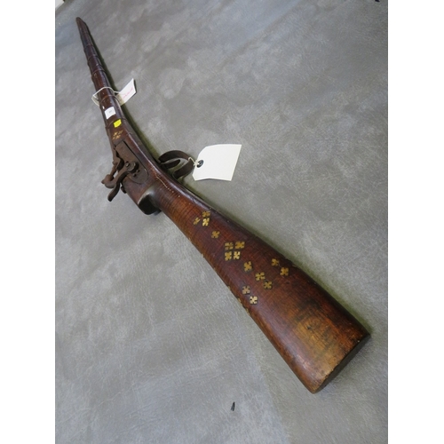 18 - A 19TH CENTURY INDIAN / MIDDLE EASTERN JAZAIL RIFLE, fitted with a percussion lock, inlaid bone deco... 