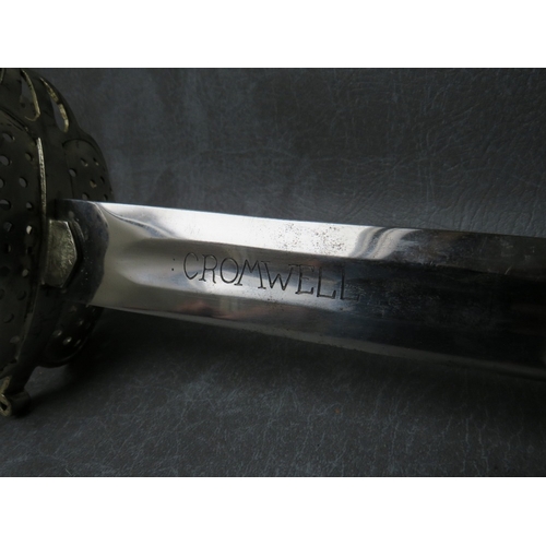 21 - A REPLICA ENGLISH CIVIL WAR SWORD, with basket hilt, engraved 'Cromwell' to the blade, (no scabbard)... 