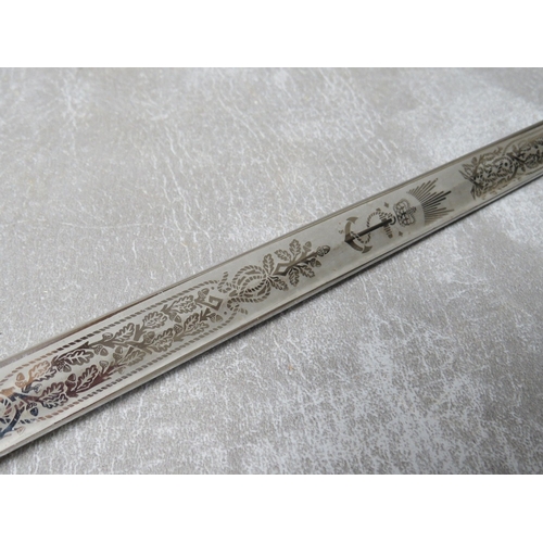 23 - A QEII ROYAL NAVY ETCHED SWORD BLADE BY RENOWN, threaded tang, L 95 cm