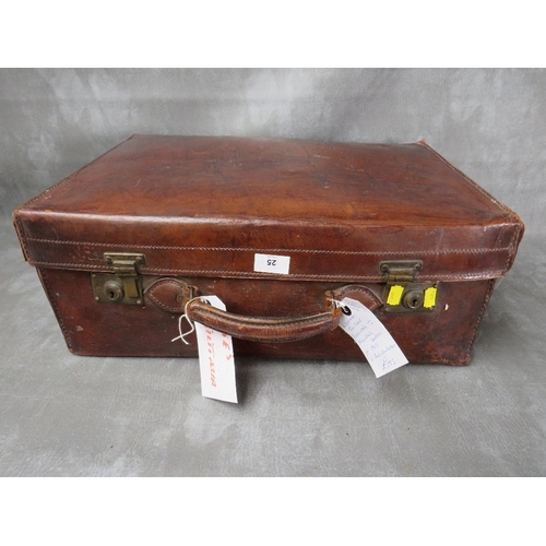 25 - AN EARLY 20TH CENTURY POLISHED LEATHER SUITCASE, with brass furniture, with presentation plaque read... 