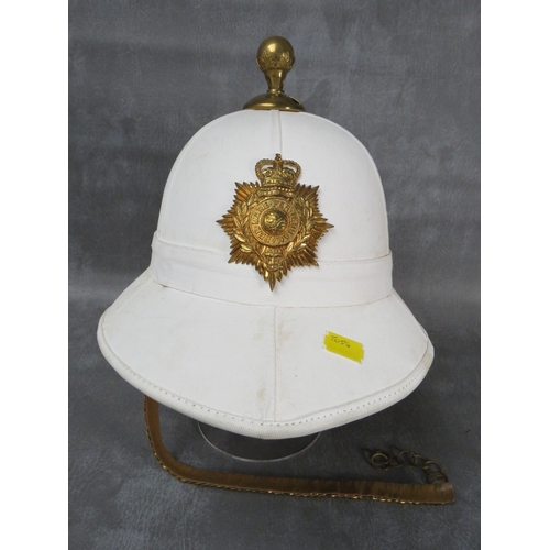 31 - A ROYAL MARINES BANDSMAN HELMET, white finish with brass furniture