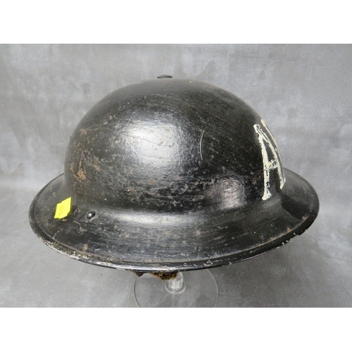 44 - A 1938 DATED ARP HELMET, black painted with white letters