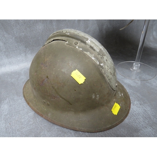 49 - A FRENCH ADRIAN TYPE HELMET SHELL, plus a 1950s Belgian type tin helmet (2)