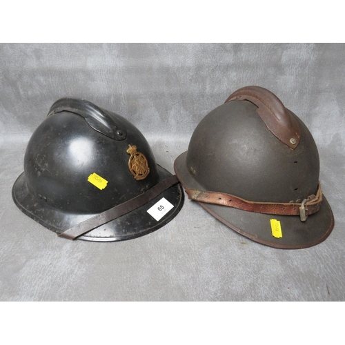 65 - AN ADRIAN TYPE HELMET, badged for Belgian Civil Defence, with black painted surfaces, together with ... 