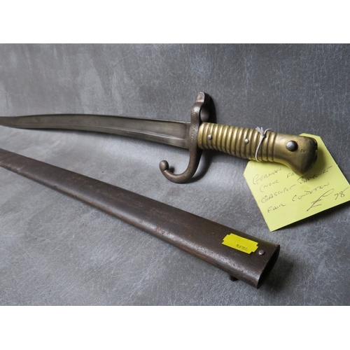 7 - A FRENCH 19TH CENTURY CHASSPOT BAYONET, with brass grip, in steel scabbard, L 70.5 cm