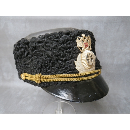 70 - A COLD WAR ERA RUSSIAN NAVY LEATHER USHANKA HAT, along with a later example (2)