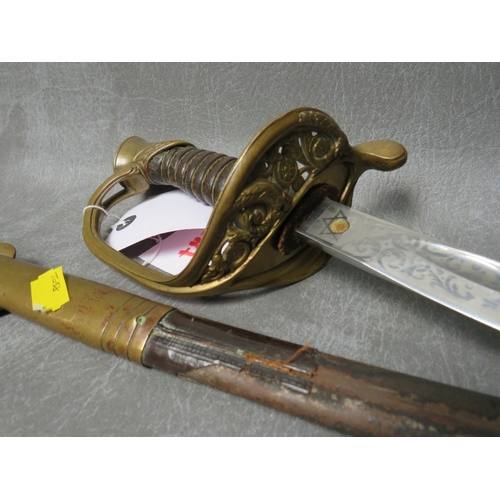 9 - U.S. MARINE CORPS DRESS SWORD, by N.S. Meyer, etched blade, with brass hilt guard, in leather and br... 