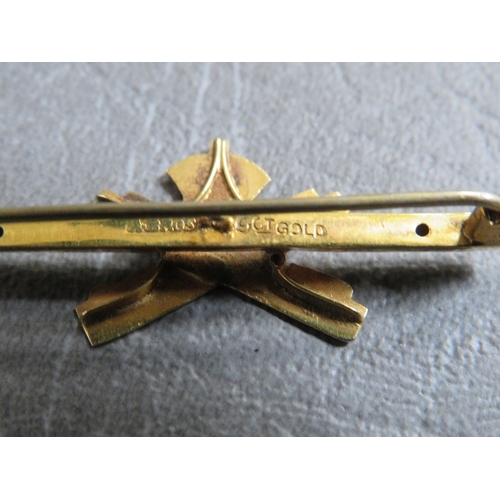 165 - A 9CT GOLD MACHINE GUN CORPS SWEETHEART BROOCH