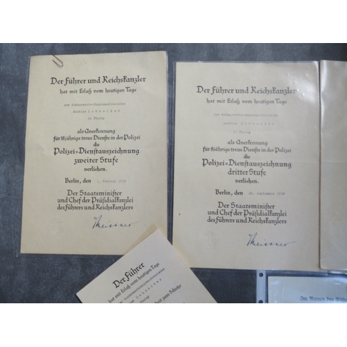 179 - A GROUP OF FIVE WWII GERMAN CITATIONS TO MATHIAS SCHNEIDER (GENDARMERE), for veterans cross 1935, 8 ... 