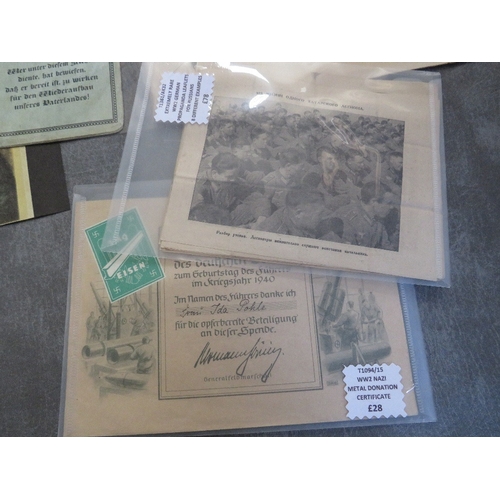 181 - A SMALL COLLECTION OF WWII GERMAN EPHEMERA & BOOKS, to include voluntary work pass, workbook with co... 