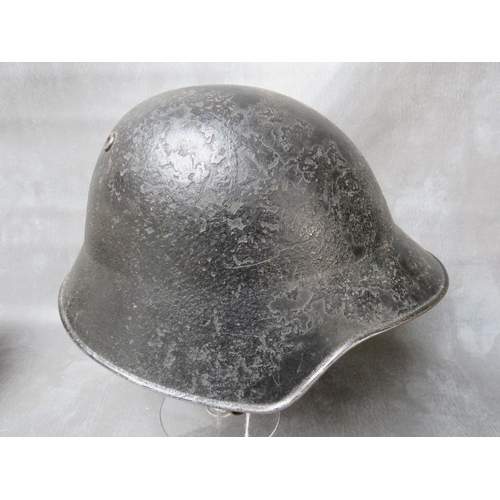 59 - FOUR TIN HELMETS, consisting of a British WW2 era shell, Czech Army, French Para type and WW2 Swiss ... 