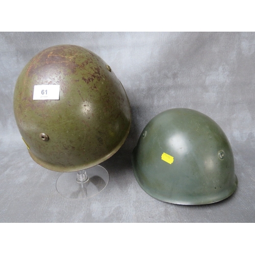 61 - TWO ITALIAN WW2 TYPE GREEN PAINTED TIN HELMETS, with leather liners (2)