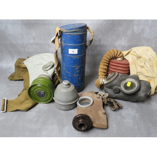 75 - A WW2 ARP GAS MASK IN BAG, (with reissue markings to bag to HMP 1952), along with a 1970s Russian ma... 