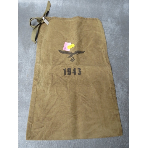 80 - A WW2 GERMAN THREE SECTION AMMO POUCH DATED 1943, a German cloth bag dated 1943 and a replica side c... 