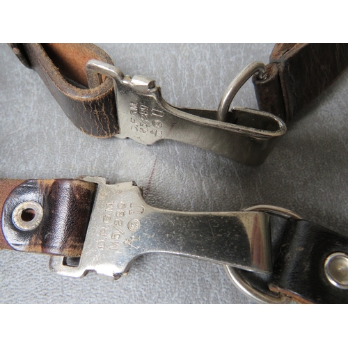 82 - A 1988 DATED GERMAN OFFICERS CROSS STRAP, the fittings with RZM marks and makers mark for Assman