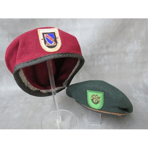 94 - TWO US SPECIAL FORCES BERETS, a dark green example (possibly 10th Div.) and a dark red example (2)