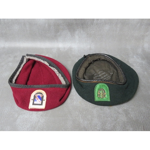 94 - TWO US SPECIAL FORCES BERETS, a dark green example (possibly 10th Div.) and a dark red example (2)