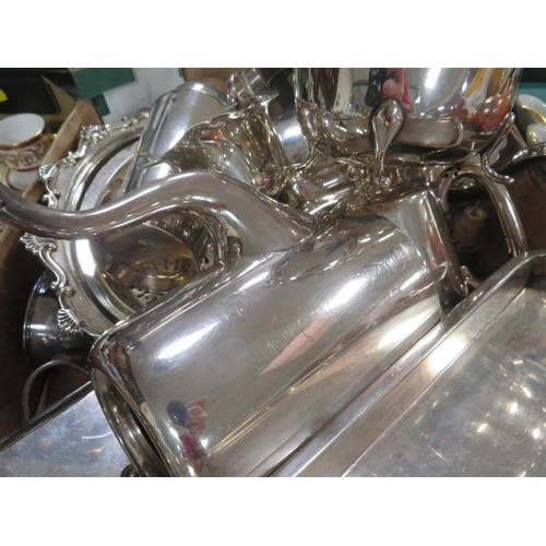 102 - A tray of assorted metal ware to include a silver plated four piece tea service