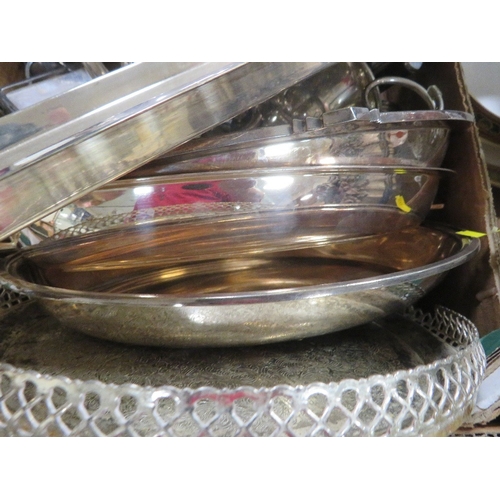 102 - A tray of assorted metal ware to include a silver plated four piece tea service