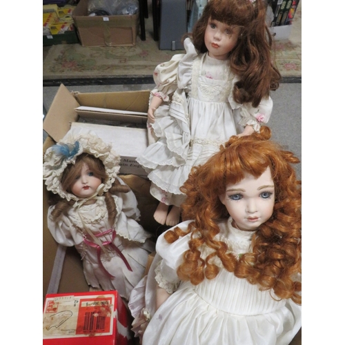 115 - A large box of porcelain dolls and dolls parts etc