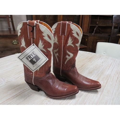 120 - A pair of FRYE hand crafted cowboy boots, dark coloured leather with typical applied country and wes... 