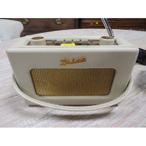 125 - Two modern Roberts DAB digital radios, both with power leads, both in working order at time of consi... 