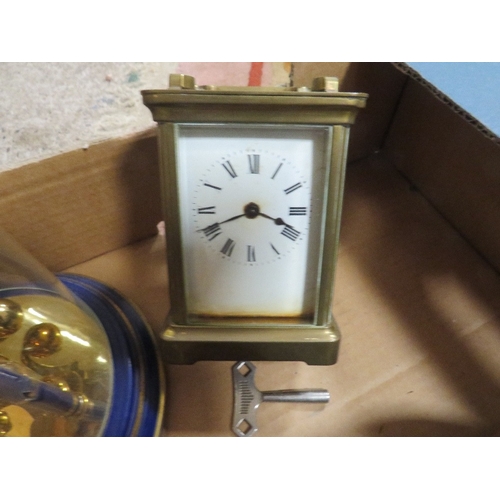 135 - A tray of vintage clocks and binoculars etc 136