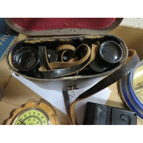 135 - A tray of vintage clocks and binoculars etc 136