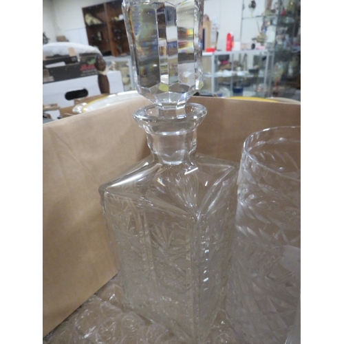 143 - Two trays of assorted cut glass etc to include drinking glasses, decanter etc