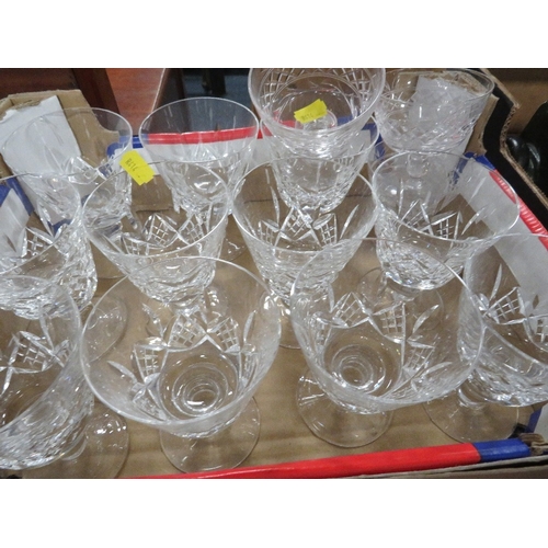 149 - Seven small trays of assorted glassware, mainly drinking glasses etc