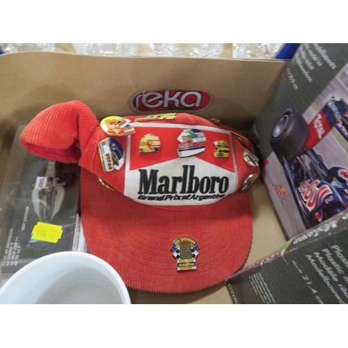 150 - A tray of Formula One collectables to include a vintage Marlboro grand Prix of Argentina hat with en... 