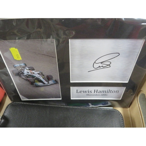 150 - A tray of Formula One collectables to include a vintage Marlboro grand Prix of Argentina hat with en... 