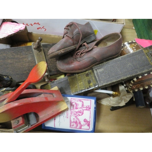 153 - A tray of collectables to include a vintage pair of shoes, paper stamps to include one for Crawshaw ... 