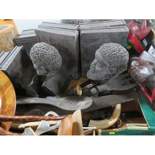 160 - A Tray of assorted African tribal treen etc together with a tray of African book ends etc