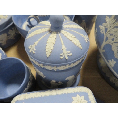 163 - A tray of assorted blue Wedgwood jasperware to include an imperial bowl