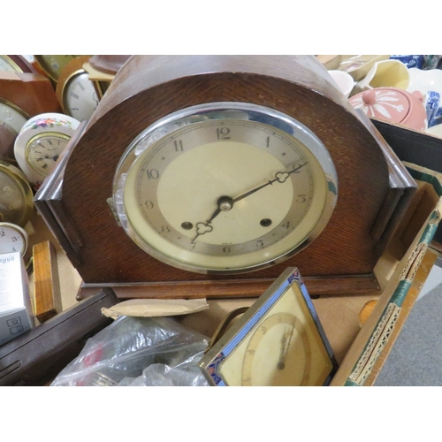 165 - Three trays of collectables and sundries to include metal ware and a tray of assorted clocks