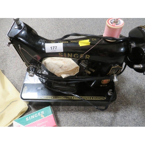 177 - A vintage electric Singer Sewing machine