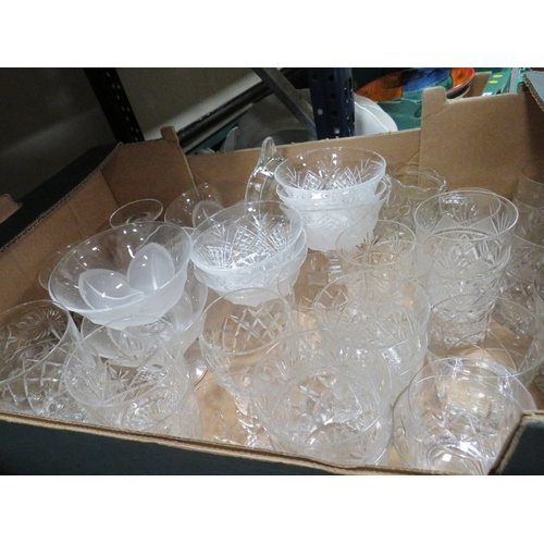 196 - Five trays of assorted glassware to include vases and bowls