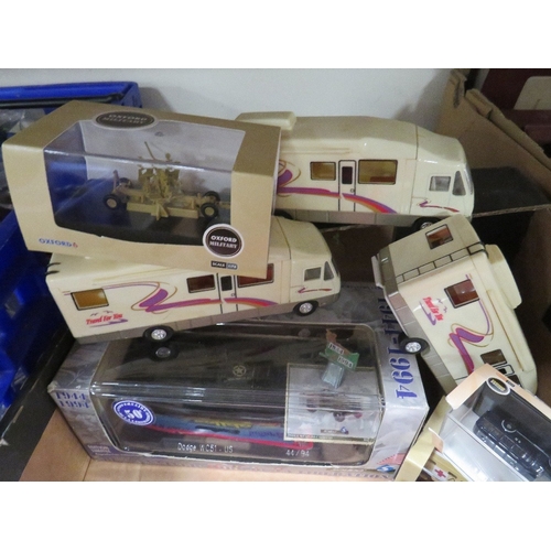 203 - Four boxed Solido military vehicles, three boxed Oxford military vehicles and three plastic camper v... 