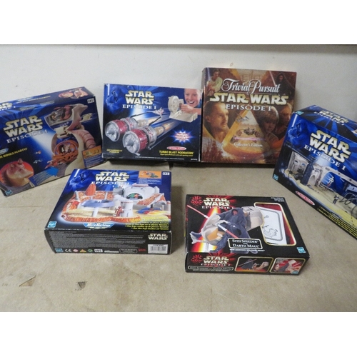 220 - Six boxed Star Wars Episode 1 items to include Podrace arena, Turbo Blast Podracers, Jar Jar Binks/N... 