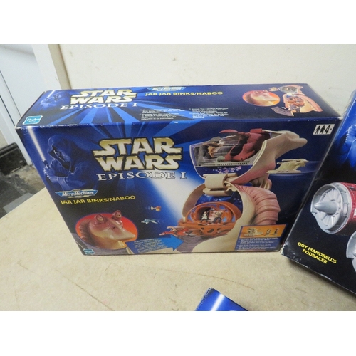 220 - Six boxed Star Wars Episode 1 items to include Podrace arena, Turbo Blast Podracers, Jar Jar Binks/N... 