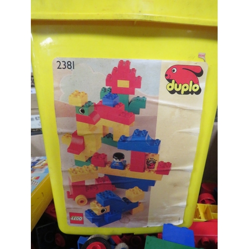 75 - A large selection of vintage toys and dolls to include Fisher Price, vintage Lego and Duplo etc